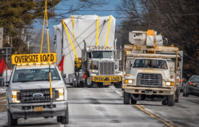 trucks hauling oversized loads